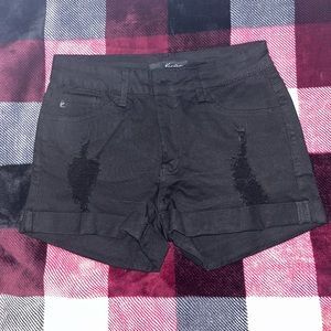 Women’s black distressed denim shorts